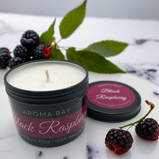 soy scented candle in a black travel tin container.