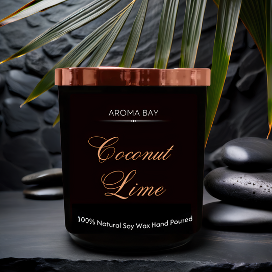 Luxury coconut and lime soy scented candle in a black glass container with gold lid.
