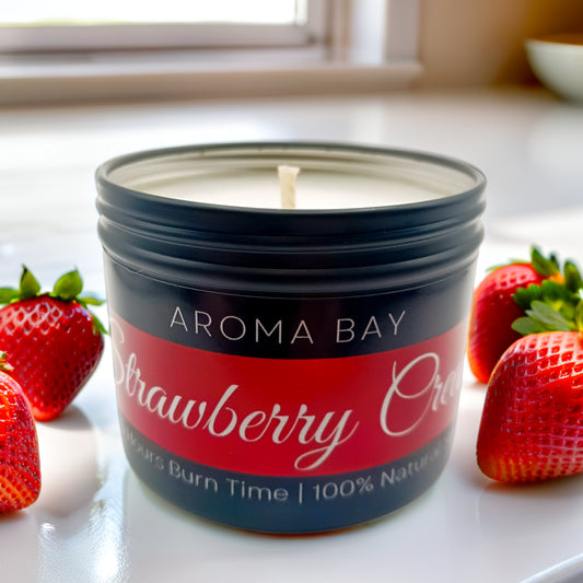 Luxury strawberry and cream fragrance soy candle in sleek black tin fun novelty candle with fruity aroma, ideal gift or travel accessory